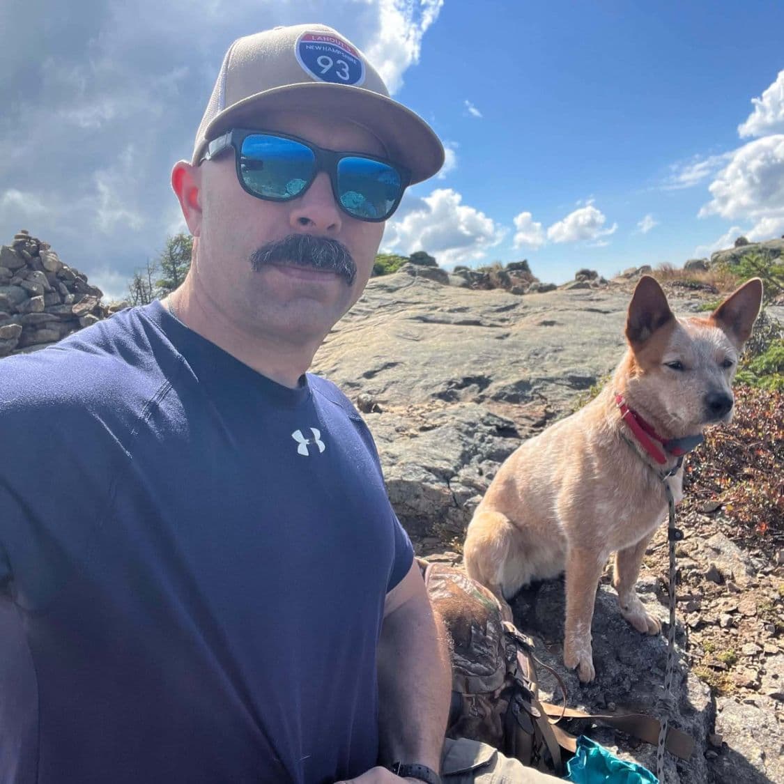 Trevor and Spring on a rocky summit during a hike